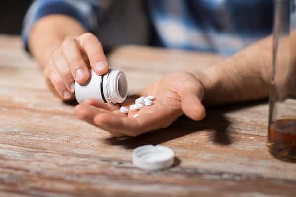 man using prescription opioids