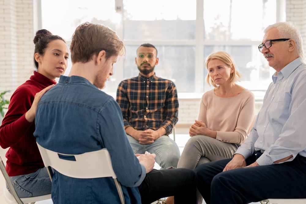 folks in group therapy at an IOP program