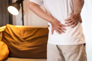 man with back pain caused by opioid induced hyperalgesia